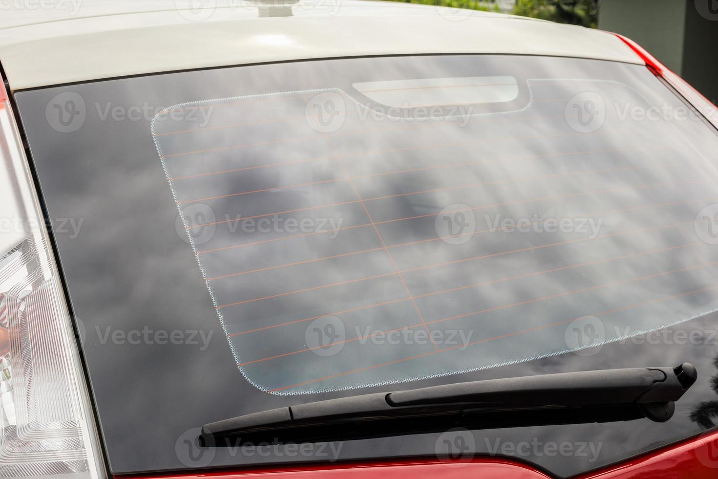 Back view of red car window for sticker mockup photo