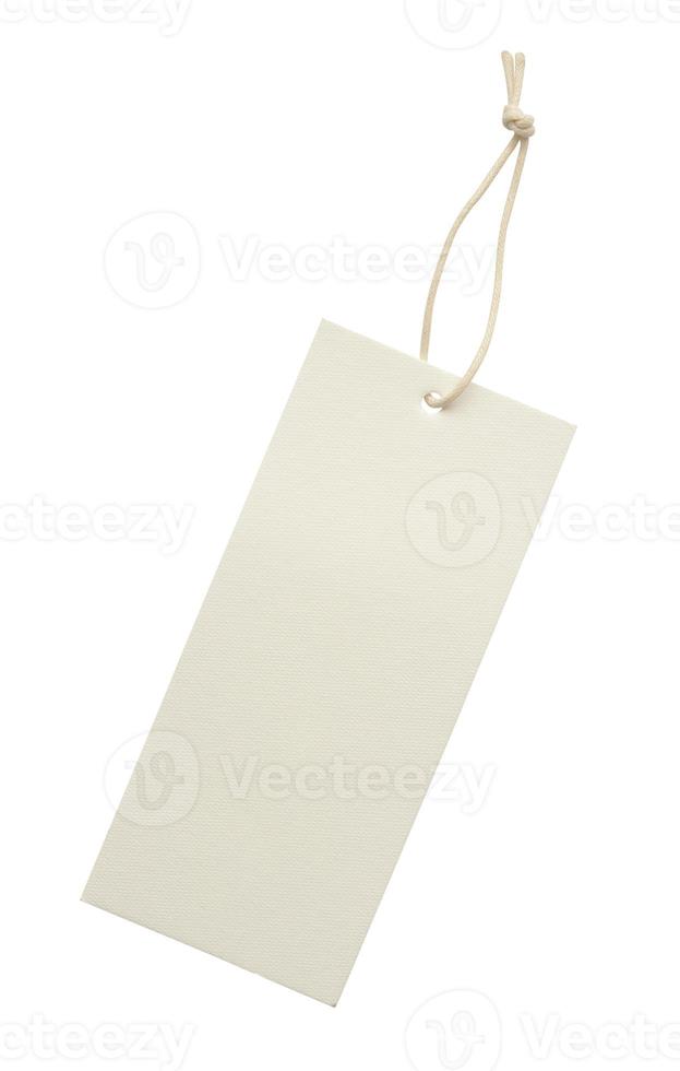 Blank price tag tied with string isolated on white background photo