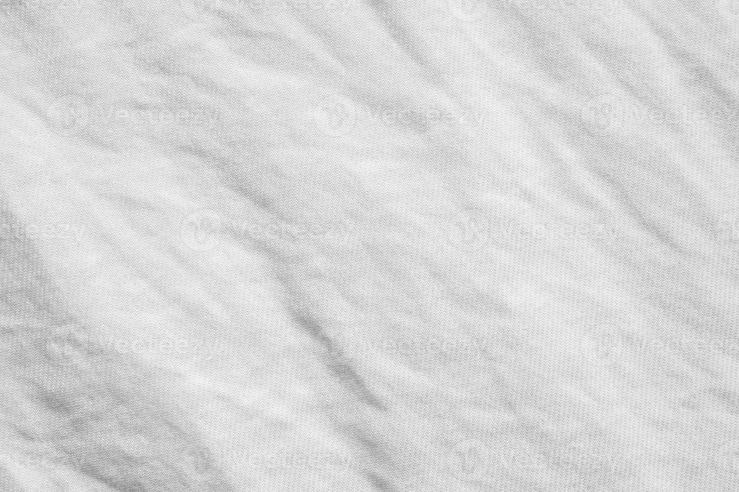 Wrinkled white cotton fabric texture background, wallpaper Stock Photo