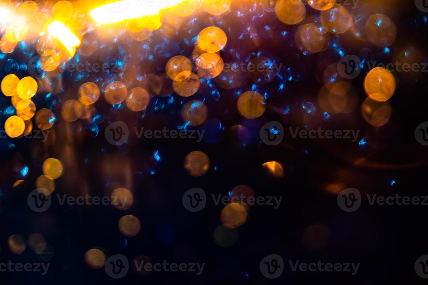 Yellow, blue, violet colored abstract defocused background photo