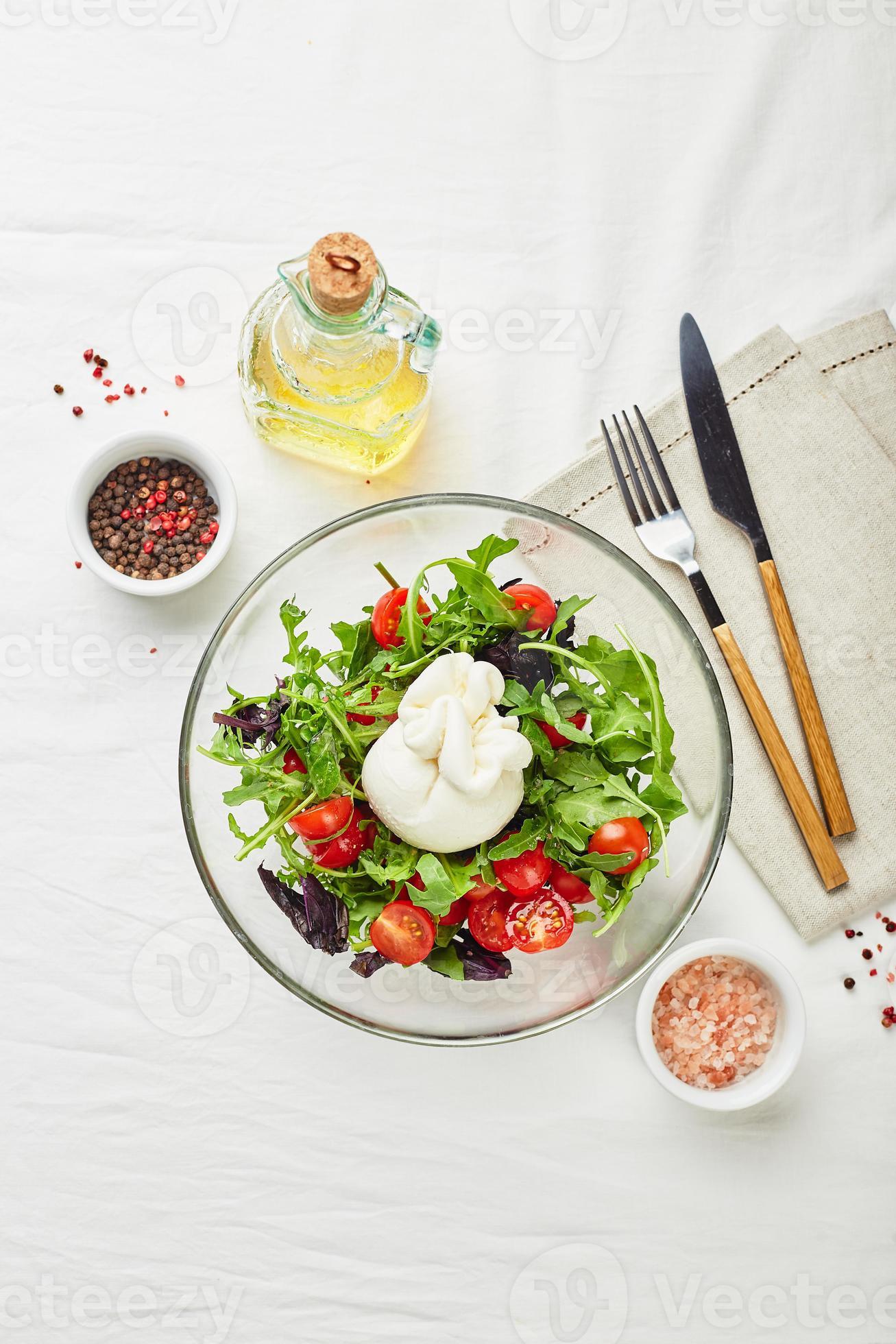 Burrata, Italian fresh cheese made from cream and buffalo or cow milk