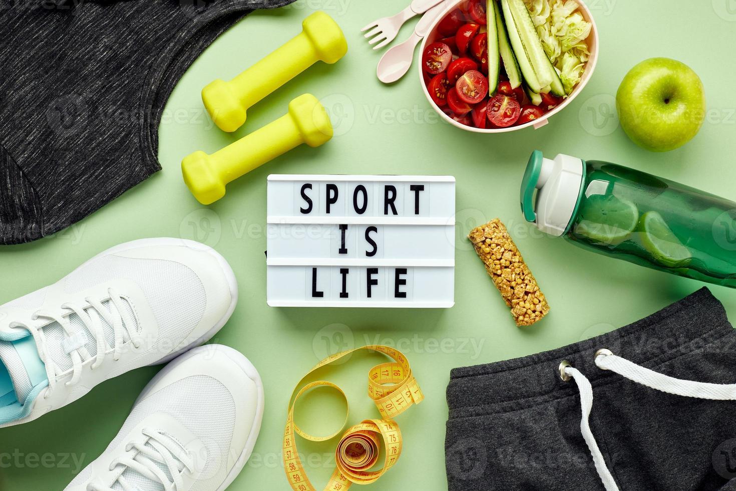 Creative flat lay of sport and fitness equipments. photo