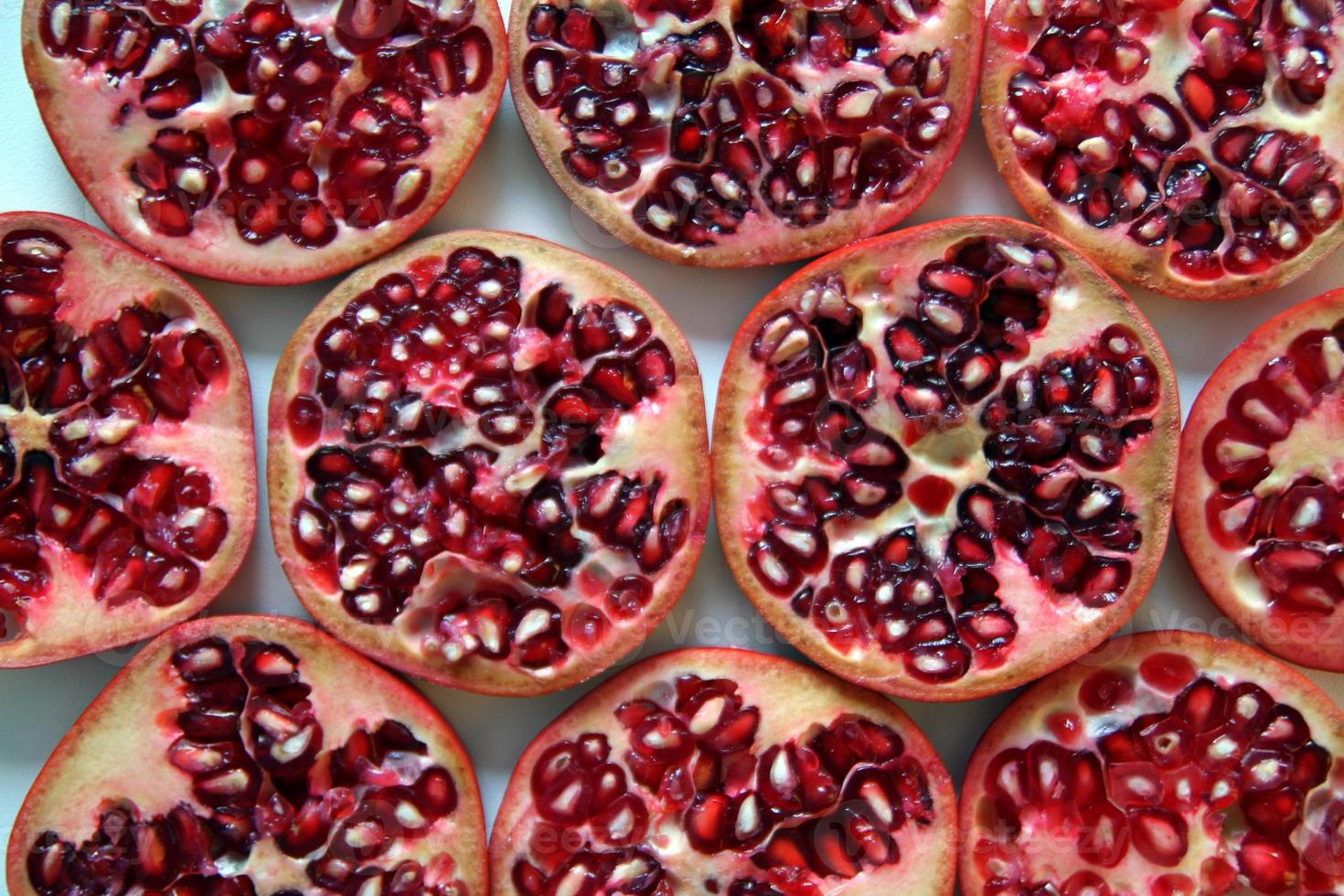 The ripe and fresh granates close up for background. photo