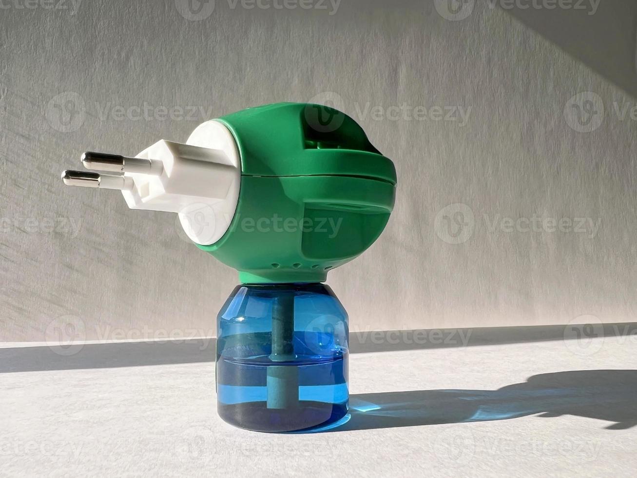 electric fumigator. fumigation indoors. repellent, mosquito repellent photo