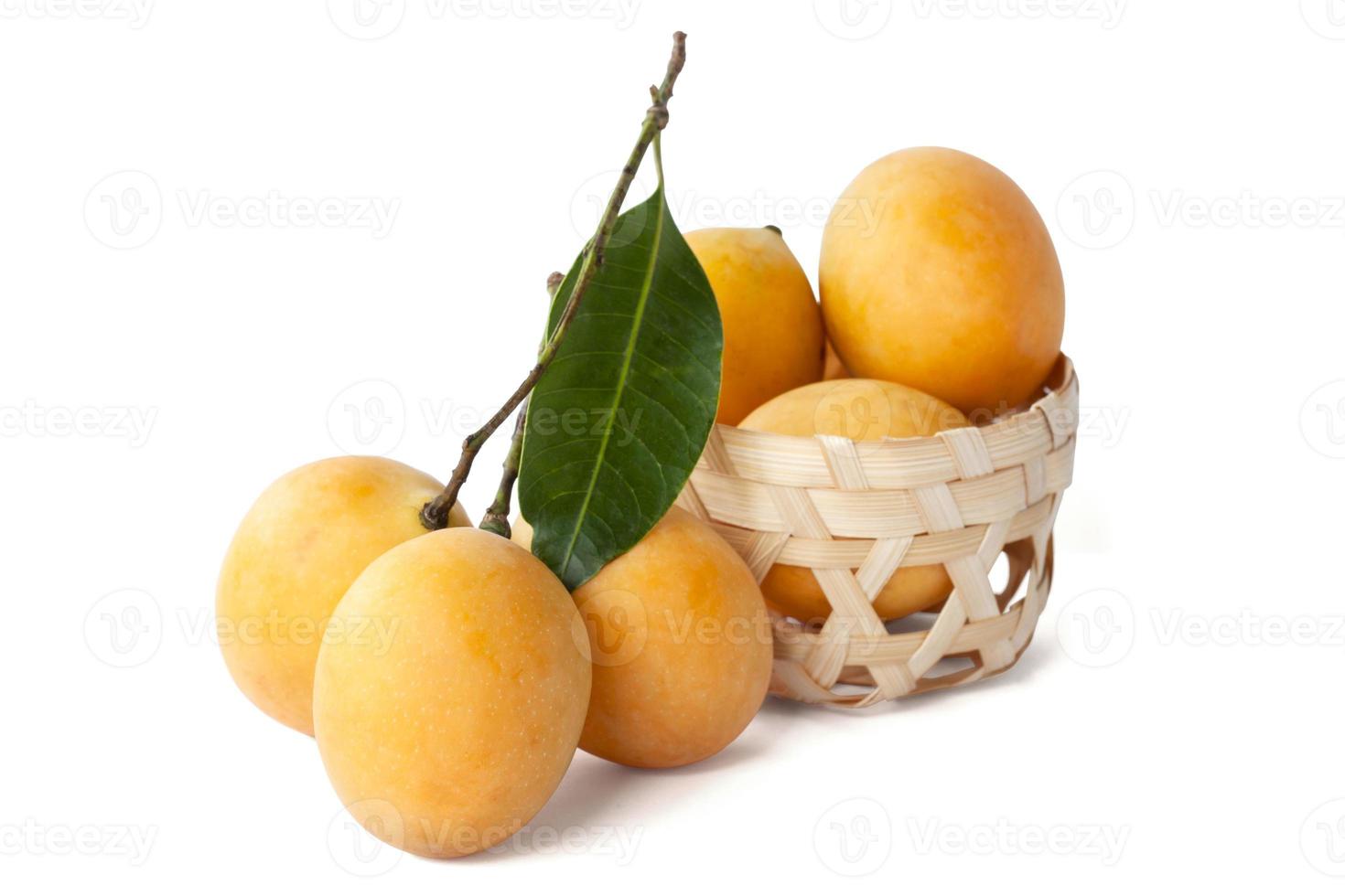 Fresh Marian Plum or Plum Mango with leaf Thai people call Ma Prang  isolated on white background. photo