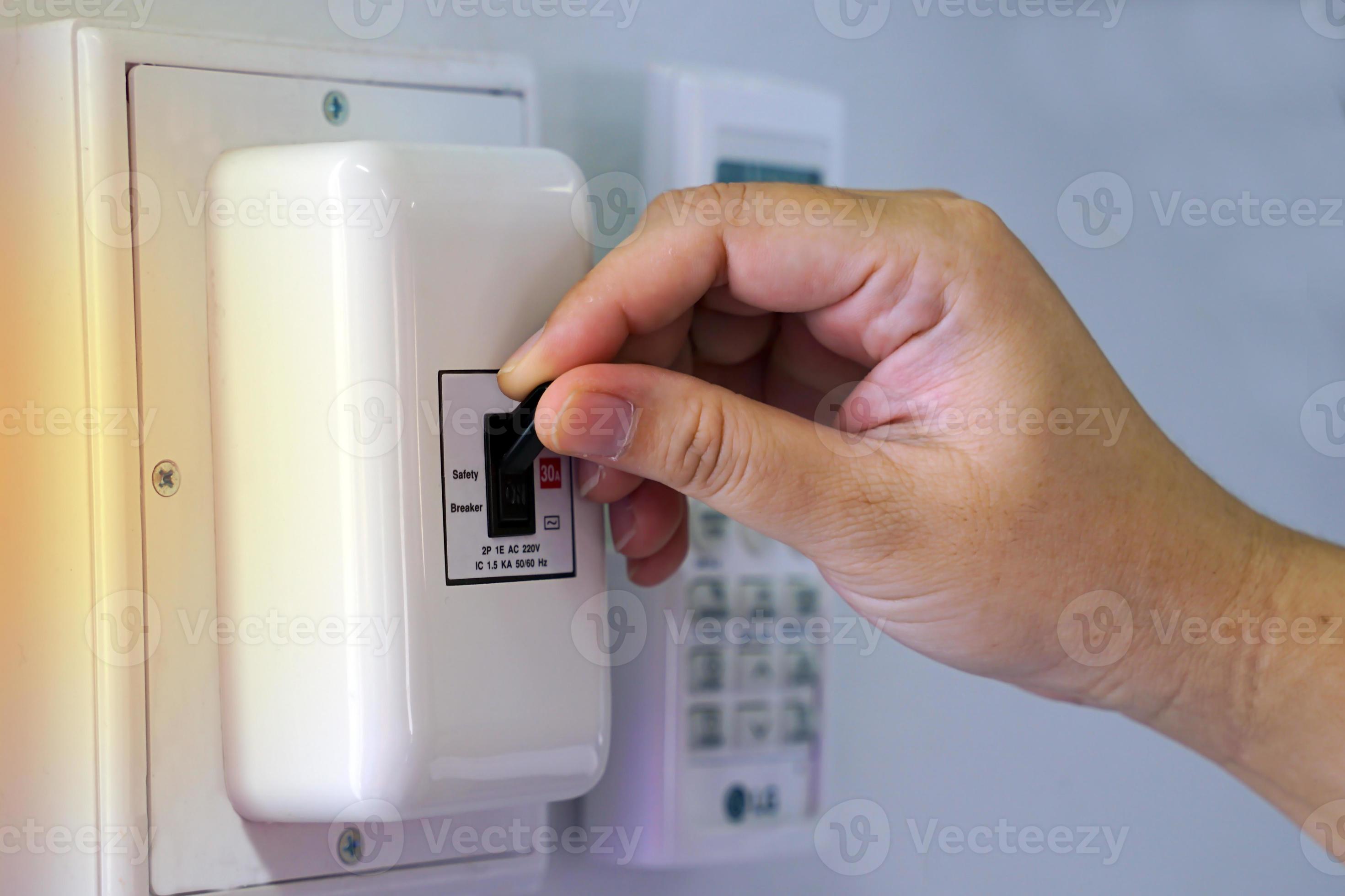 Turn off the air conditioner breaker after use. Concept to conserve