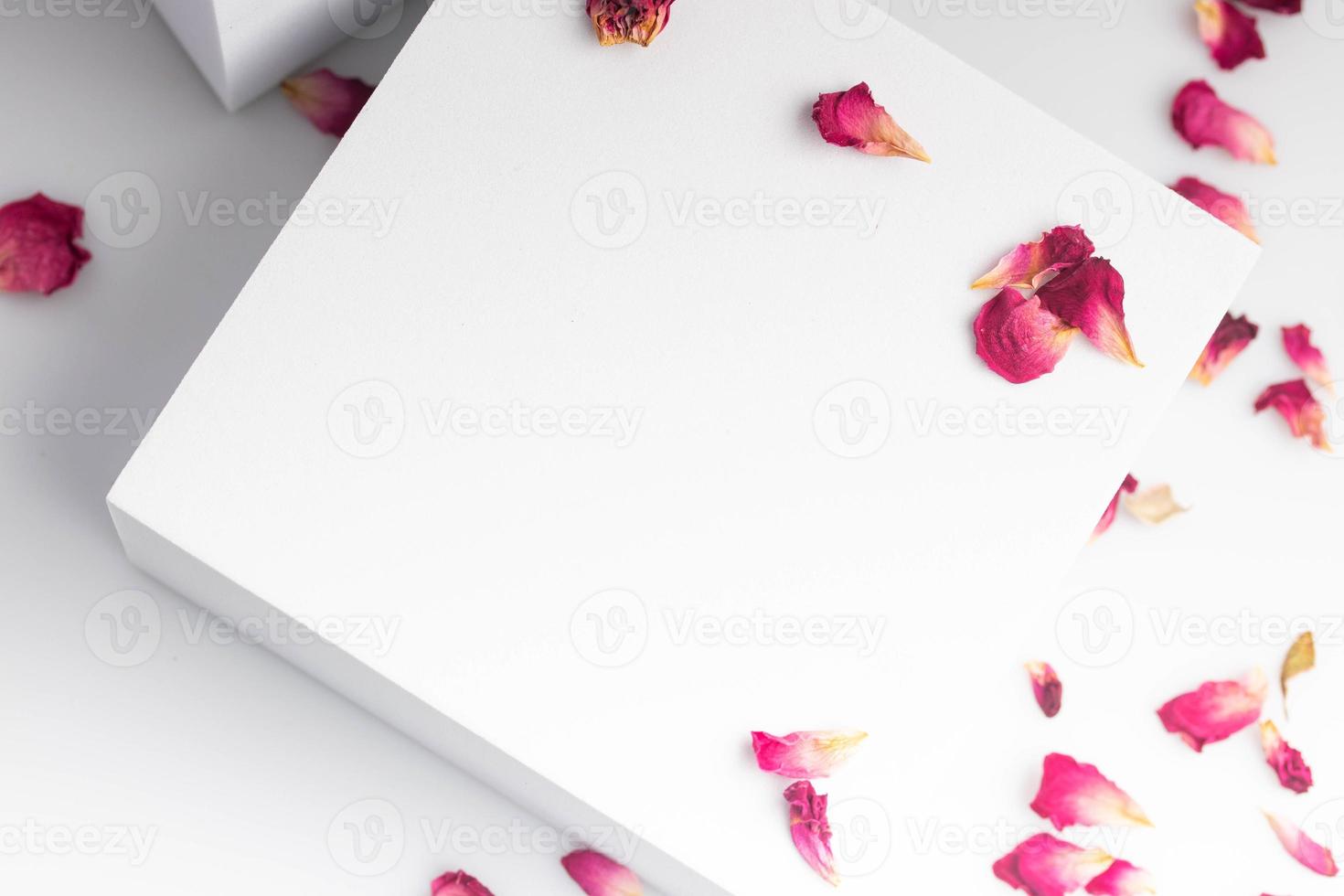 White product stand, mock up on a white background texture background Ideal backdrop for product presentations, exhibitions and mockups. photo