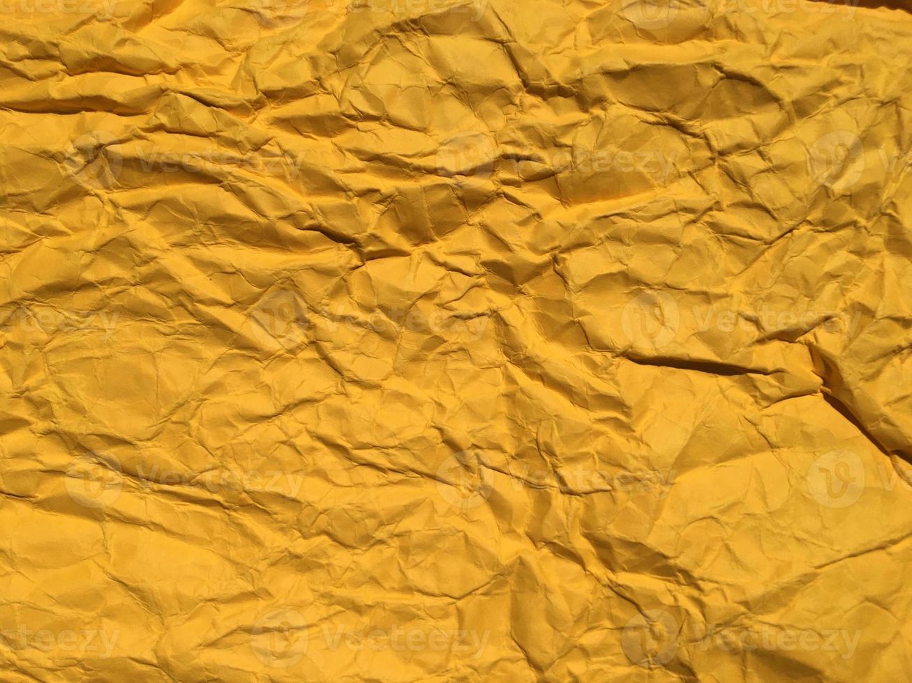 Yellow wrinkled paper background for Design. Copy space for text or work photo