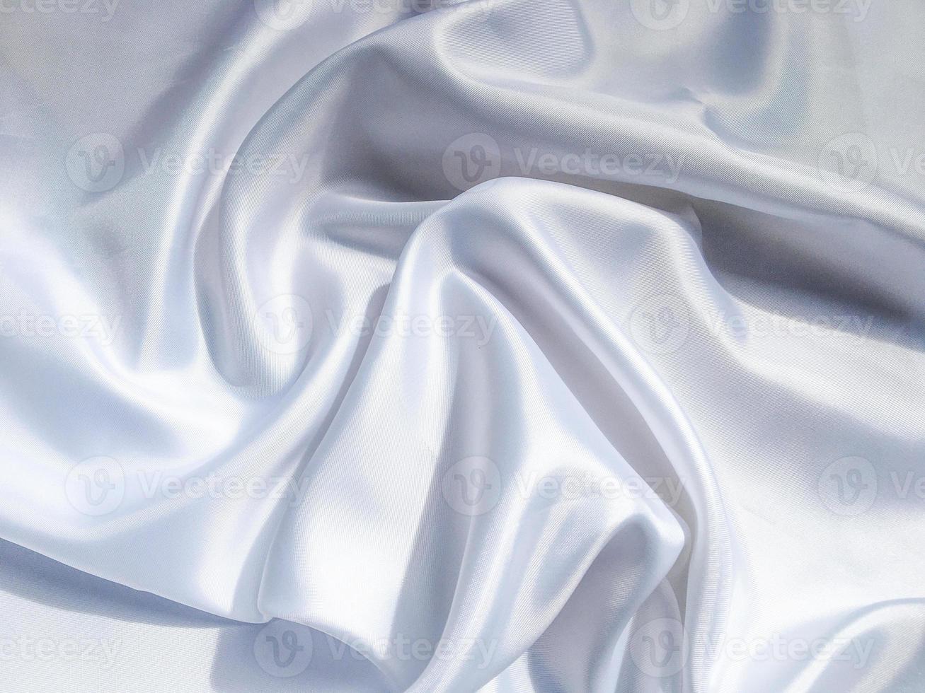 Solf white satin fabric texture background. use as wedding or aniversary day with copy space for design photo