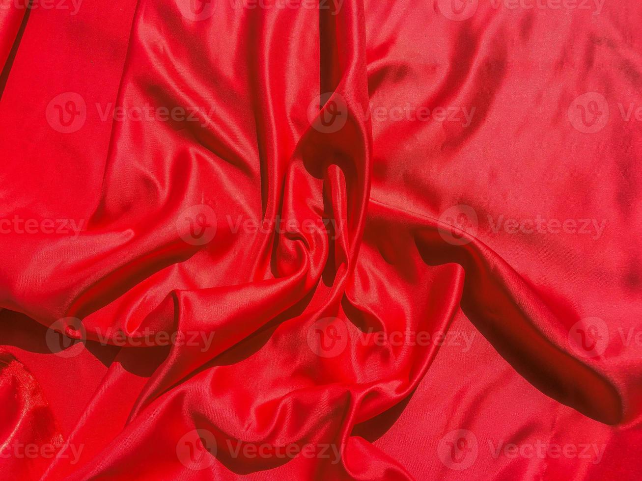 Red fabric texture for backgroundwith coy space. Valentines Day or Christmas Day wallpaper design photo