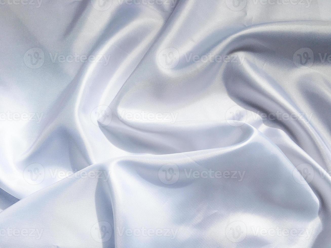 Solf white satin fabric texture background. use as wedding or aniversary day with copy space for design photo