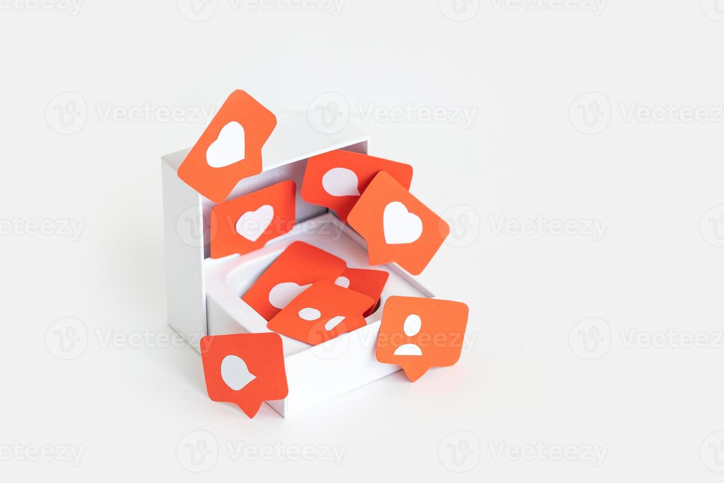 White box filled with Likes, subscriptions, messages from subscribers. Selective focus. Exchange and share likes and subscriptions in social network. photo