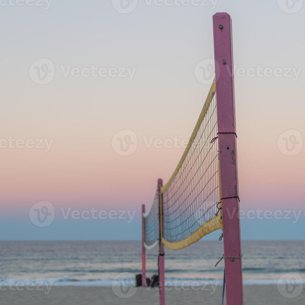 Beach volleyball net sunset at Surfers paradise, Gold Coast photo