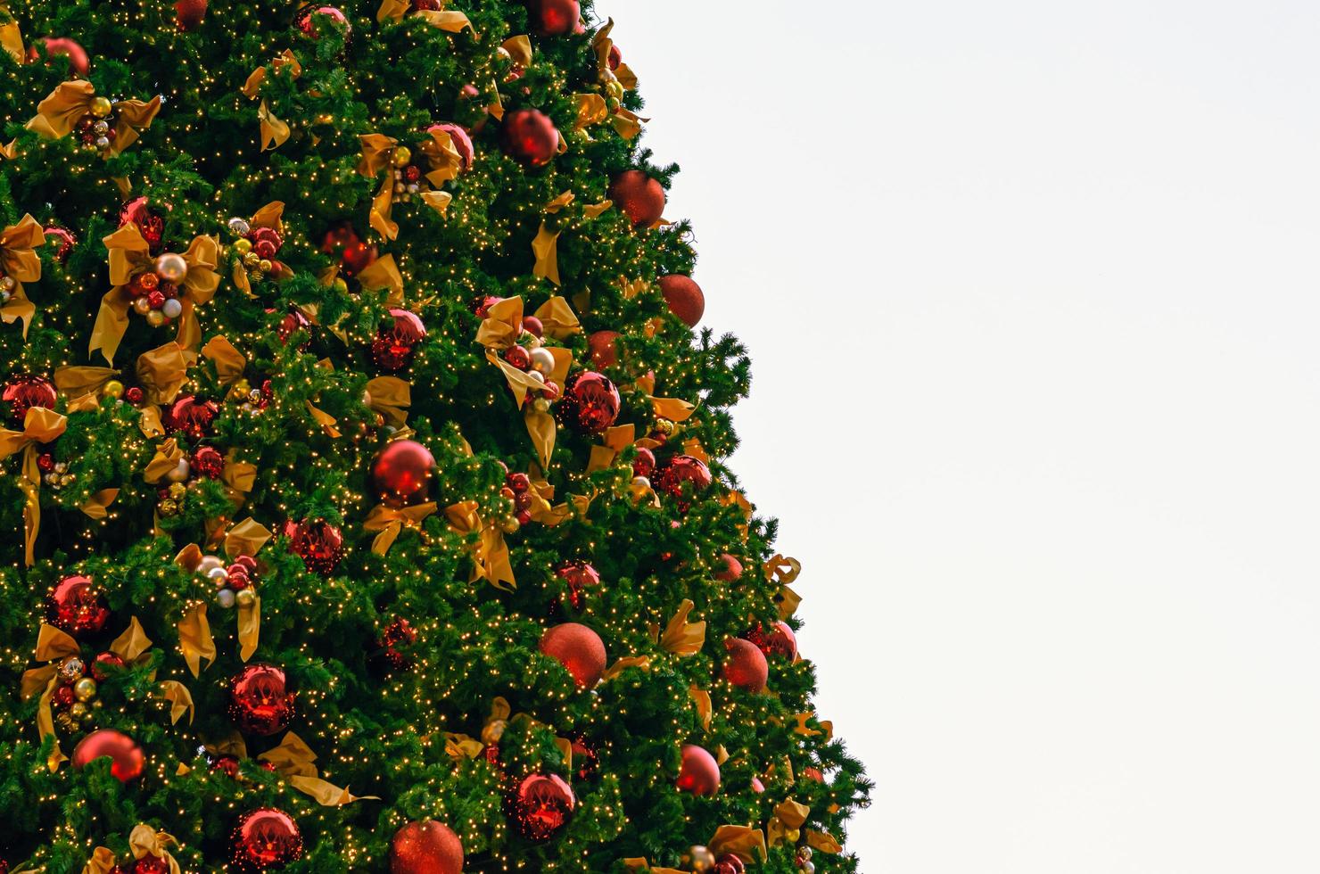 Christmas tree decorates with many ornaments for Christmas Holiday festival. photo