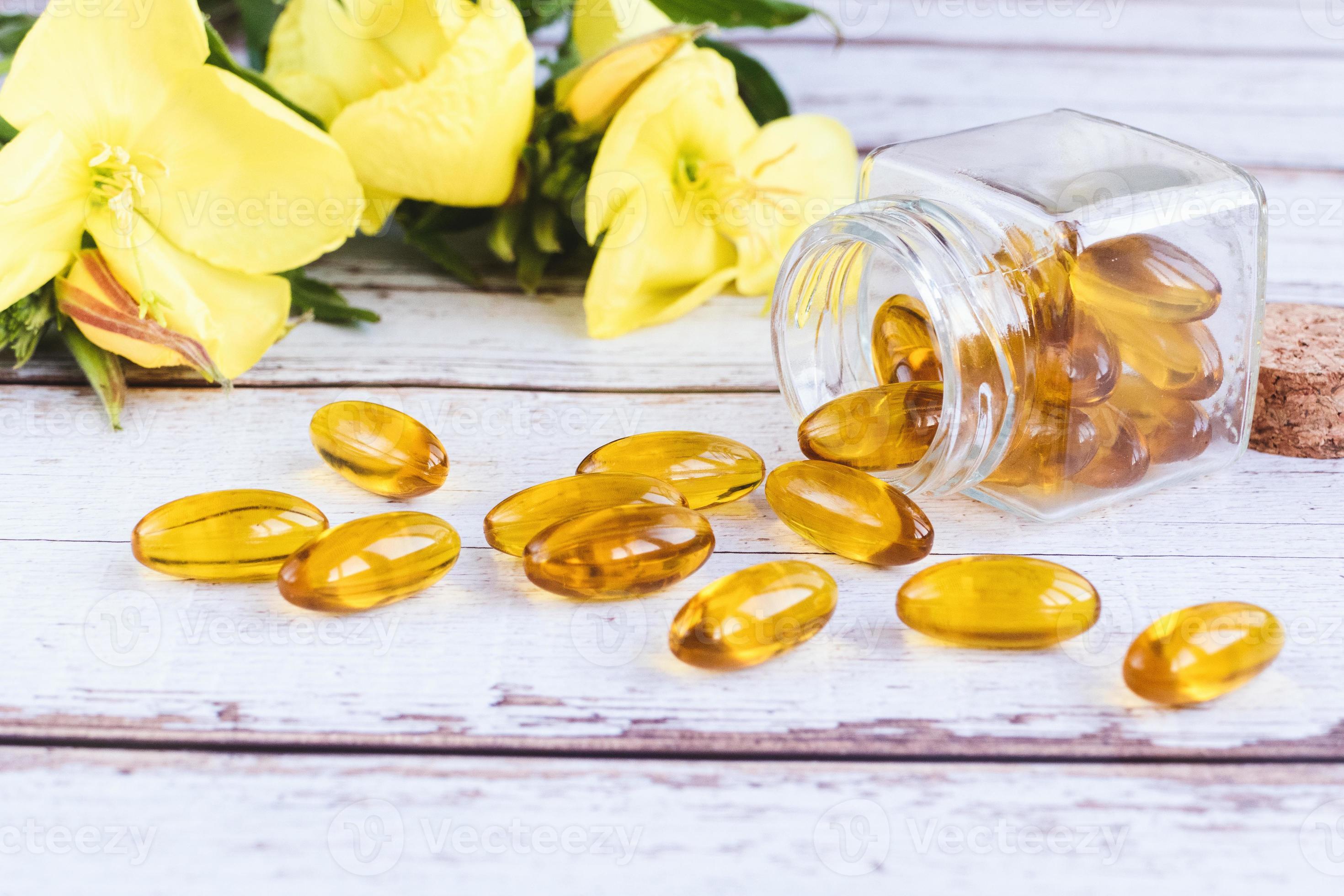 Evening primrose oil softgels, herbal medicine supplement, flowers of