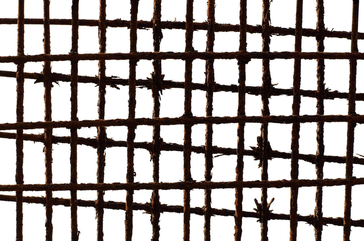 Background texture photo of old grilling basket that have rust on them put in many layers on white background.