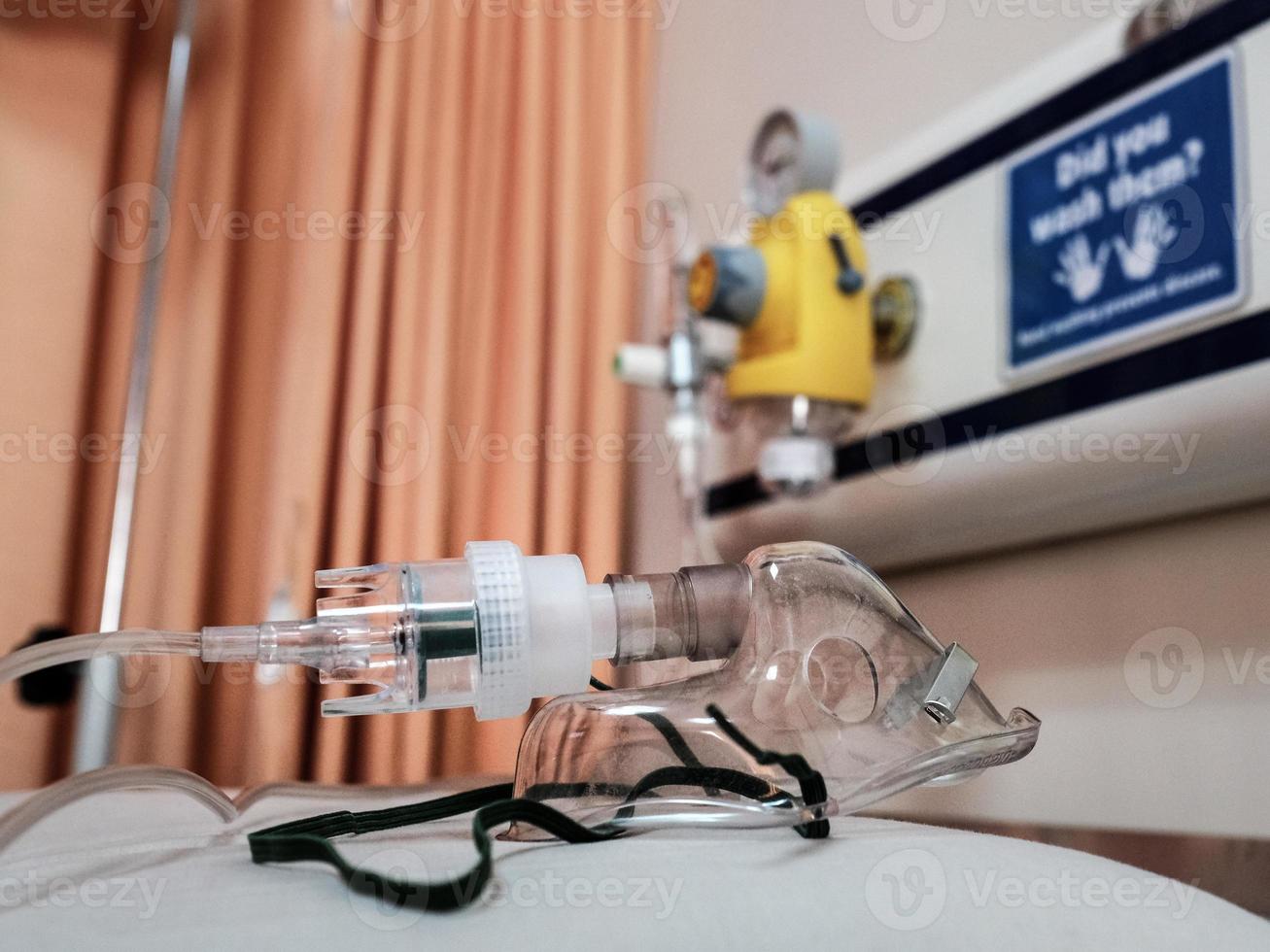 Close-up view of a respiratory equipment on a hospital bed photo