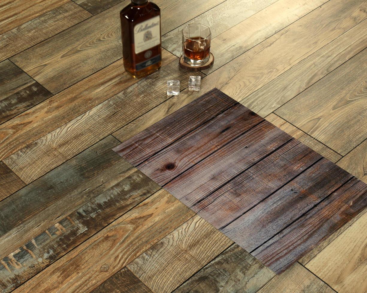 New Delhi, Delhi, IN, 2022 - Classic wooden style rectangle doormat placed with Whiskey and Glass photo