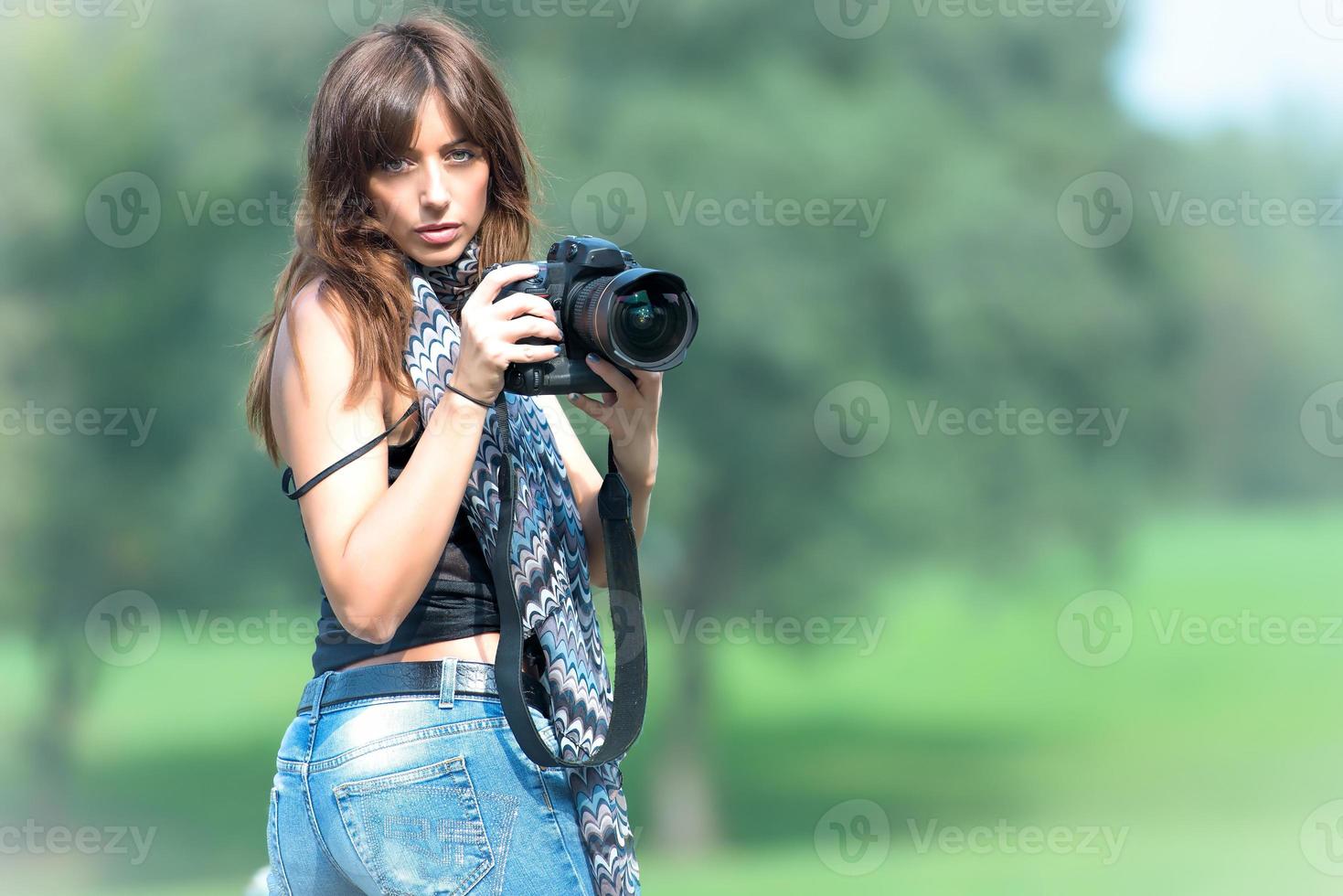 Beautiful woman photographer photo