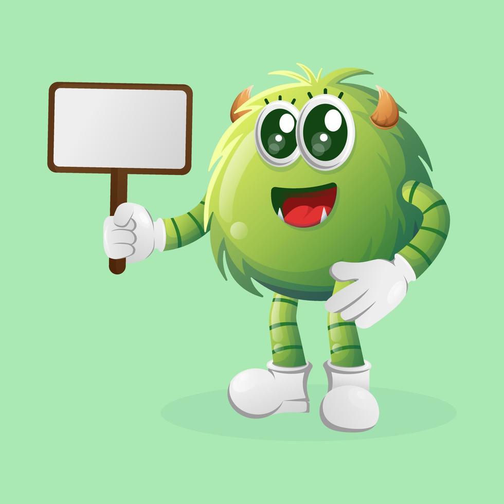 Cute green monster holding billboards vector