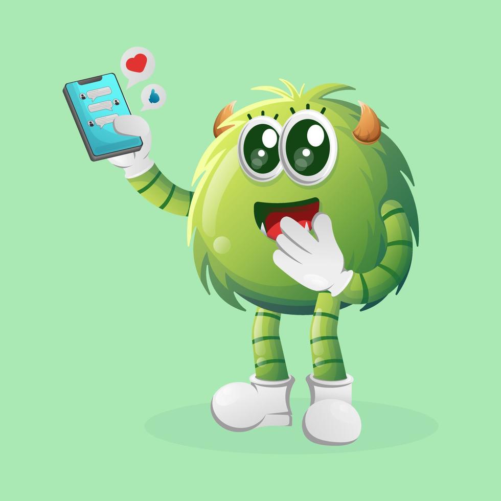 Cute green monster holding mobile phone with text messages vector