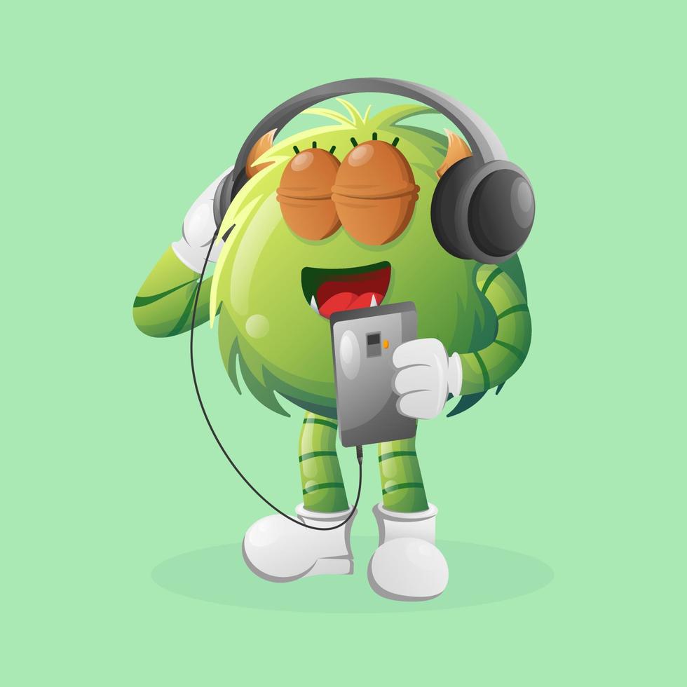 Cute green monster listening music on a smartphone using a headphone vector