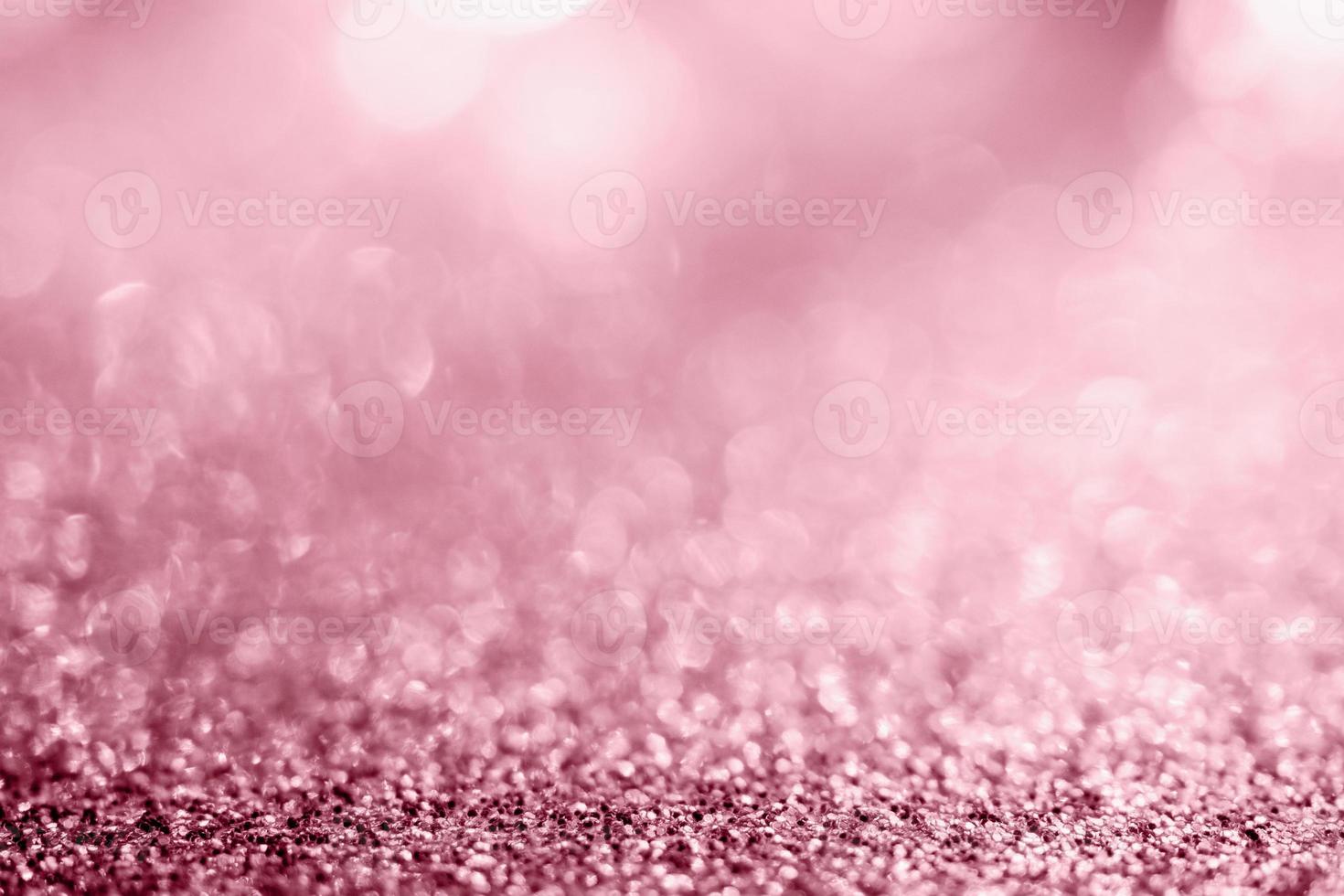 Abstract rose gold glitter sparkle texture with bokeh background photo