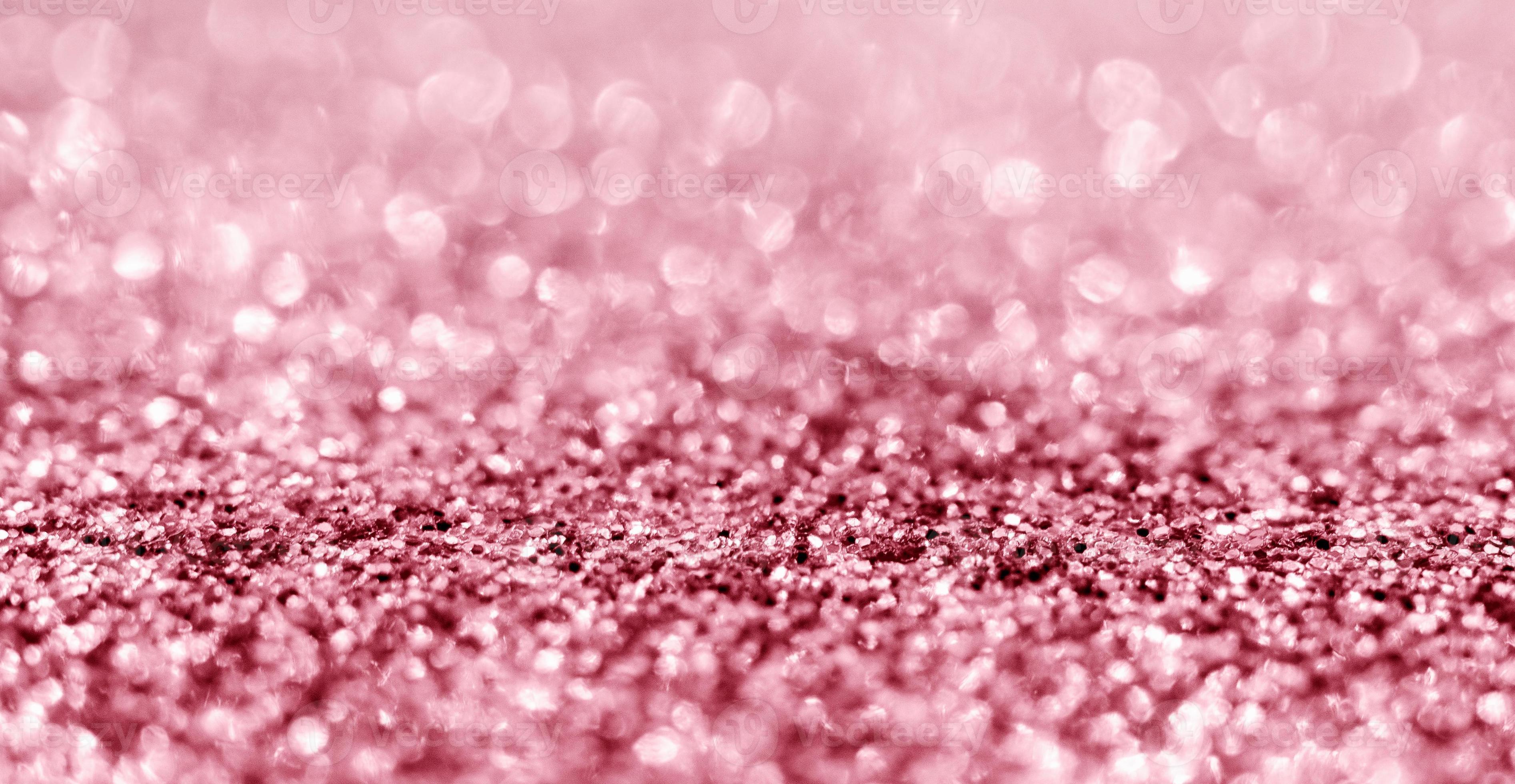 Abstract rose gold glitter sparkle texture with bokeh background