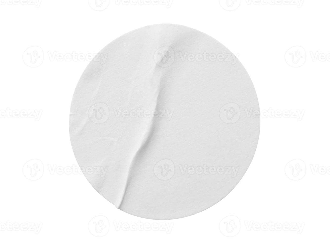 Blank white round paper sticker label isolated on white background photo