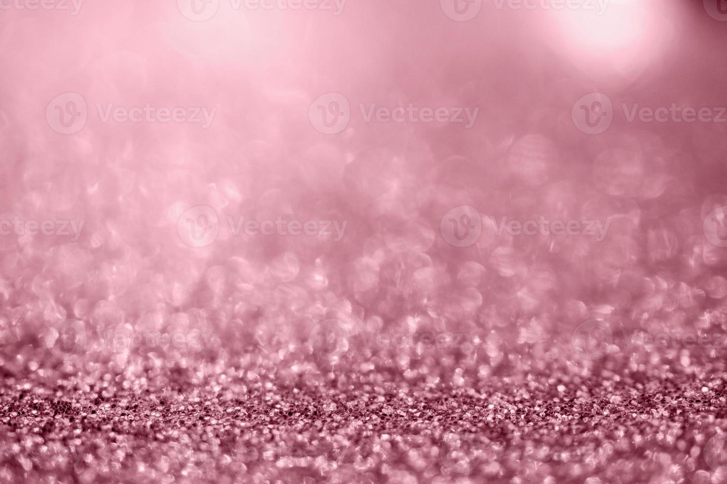 Abstract rose gold glitter sparkle texture with bokeh background photo
