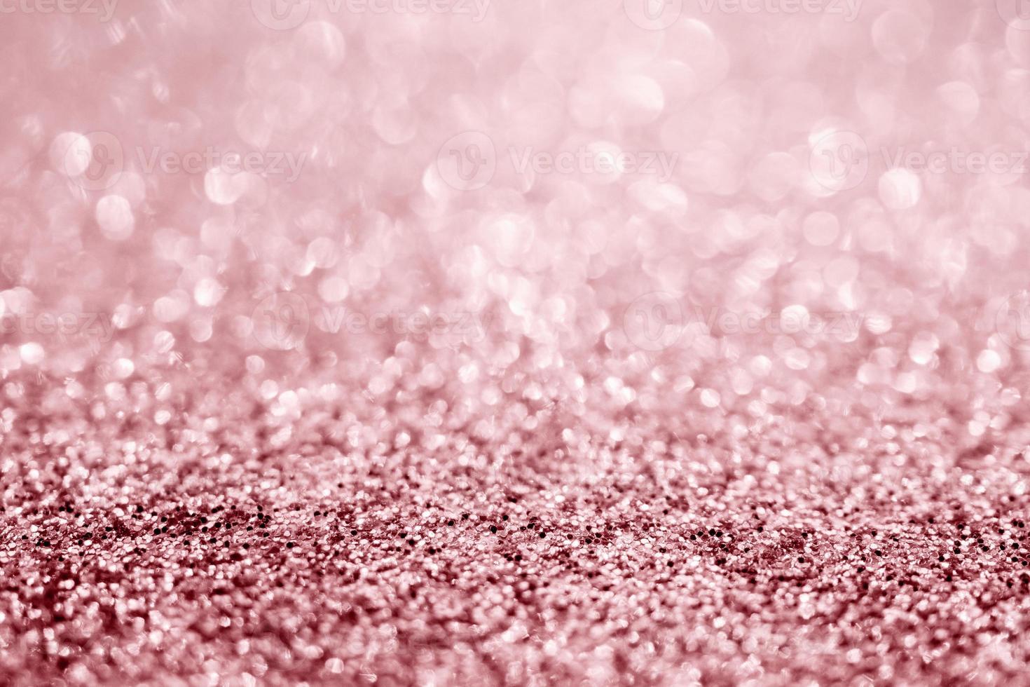 Abstract rose gold glitter sparkle texture with bokeh background photo
