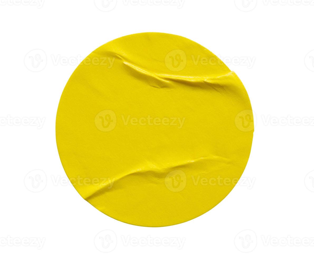 Yellow round paper sticker label isolated on white background photo