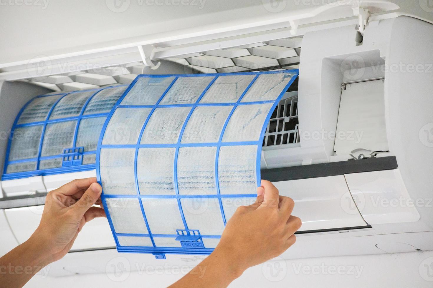 man hand hold air conditioner filter cleaning concept photo