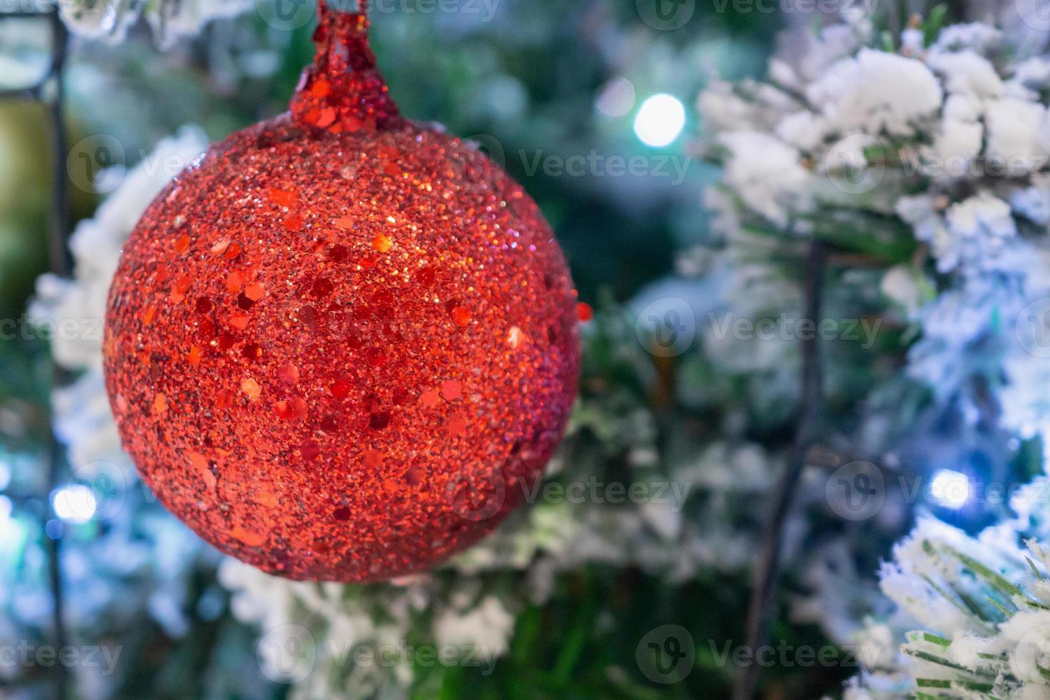 Decorated Christmas tree with red ball New Year holidays background photo