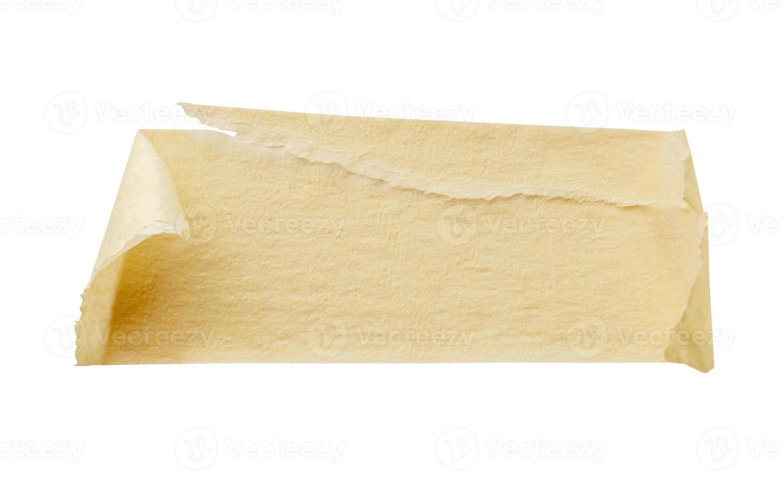 Yellow adhesive paper tape isolated on white background photo