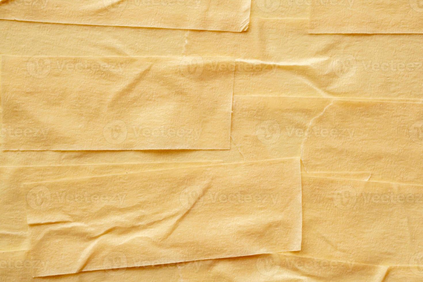 Yellow adhesive paper tape texture background photo