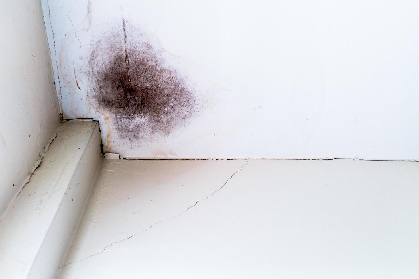 Water damaged ceiling roof and Crack on the wall photo