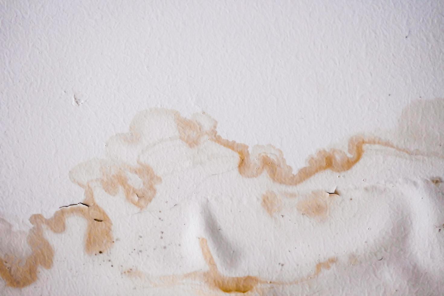 Water damaged ceiling  roof in an old abandoned house. photo