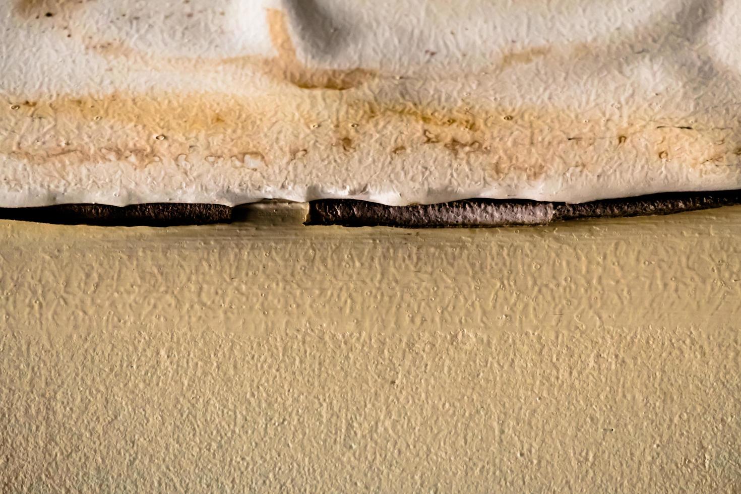 Water damaged ceiling roof, leakage brown stain, office building photo