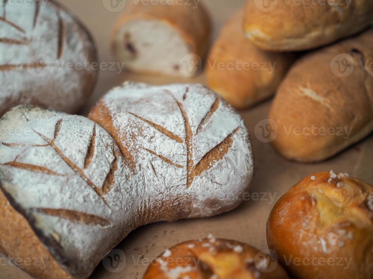 A full set of French bread on a table photo