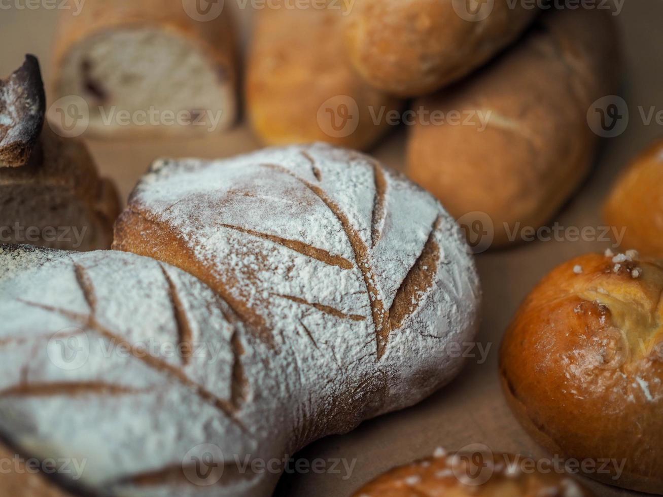 A full set of French bread on a table photo
