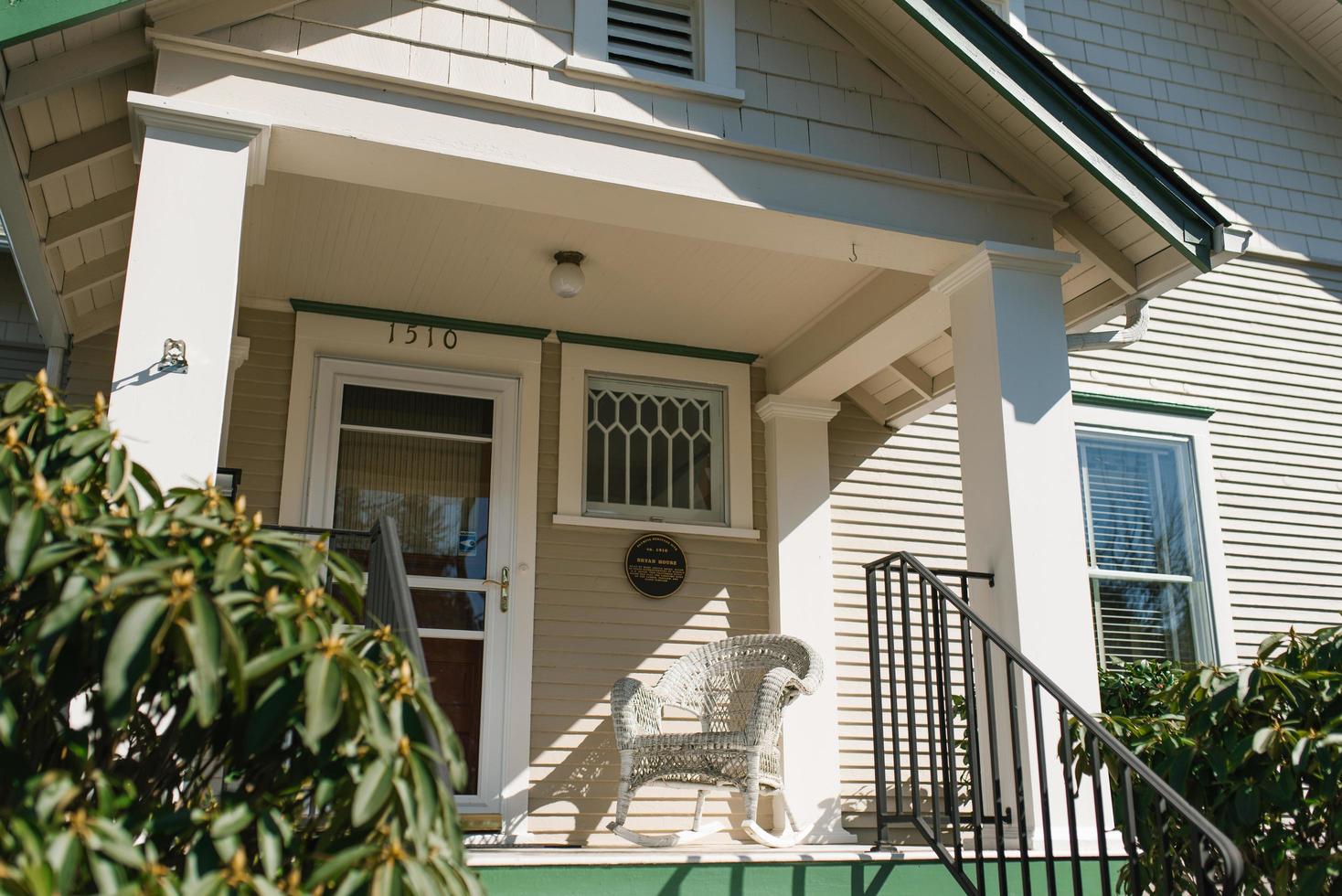 Olympia, Washington, USA. March 2021. Facade of the main entrance to a private house near the Capitol on a sunny spring day photo
