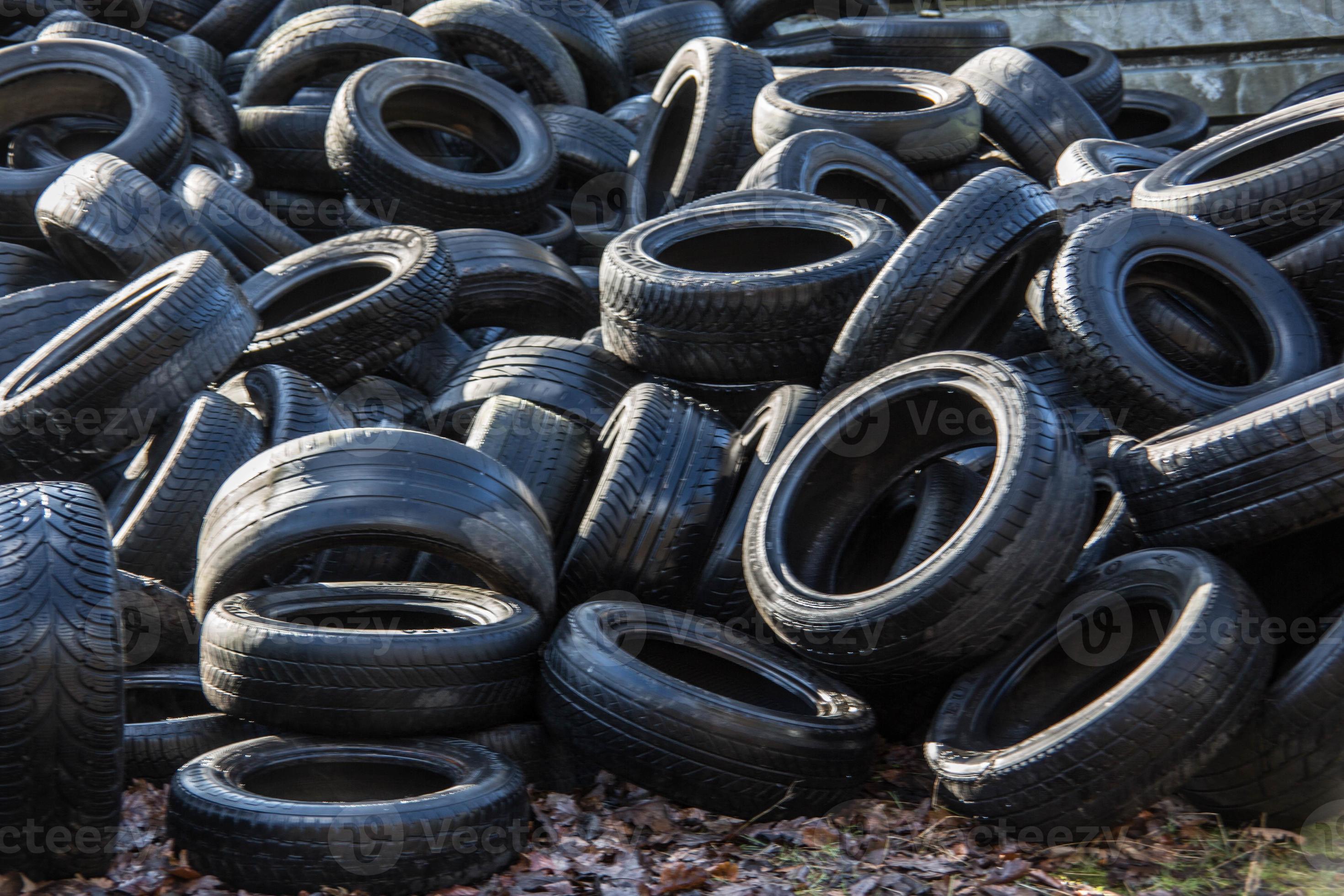 large pile of used tires for recycling 12952681 Stock Photo at Vecteezy