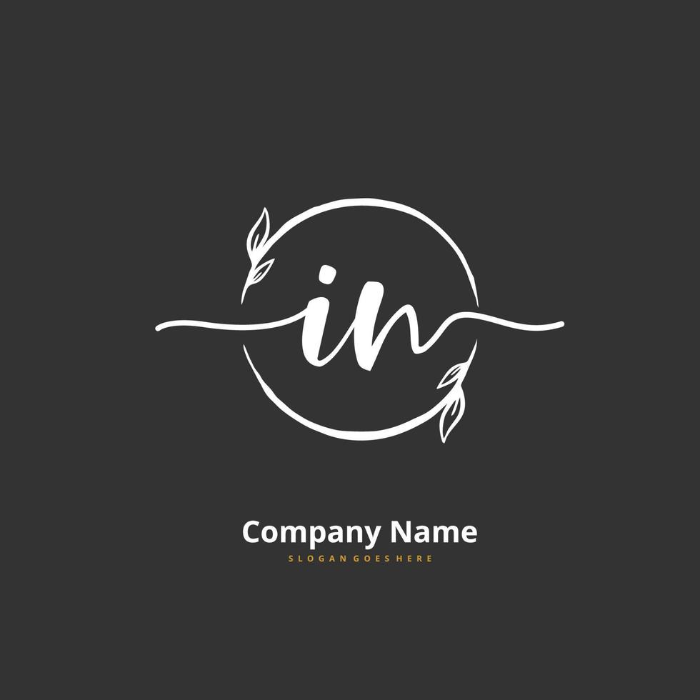 IN Initial handwriting and signature logo design with circle. Beautiful design handwritten logo for fashion, team, wedding, luxury logo. vector