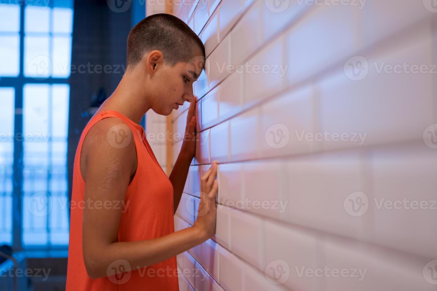 Frustrated young woman is standing in bathroom. Depression crying have 12965355 Stock Photo at