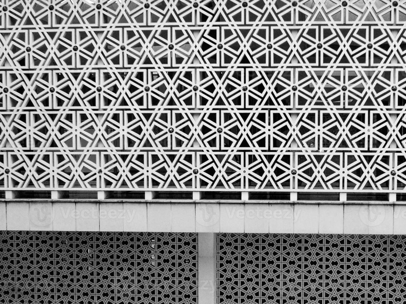 Close-up view of concrete islamic geometrical design in the mosque in Kuala Lumpur, Malaysia photo