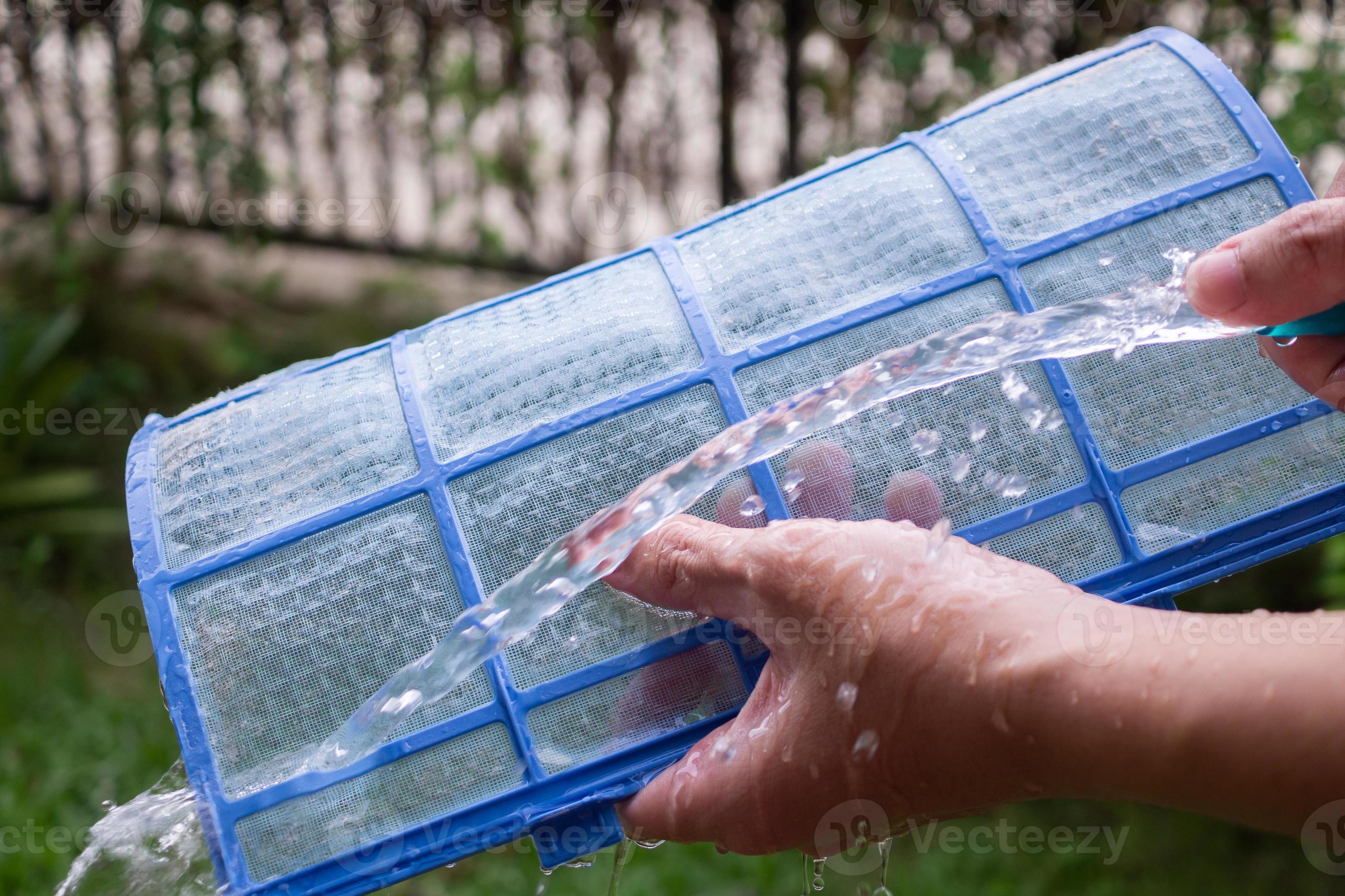 cleaning air conditioner dirty filter 12967574 Stock Photo at Vecteezy