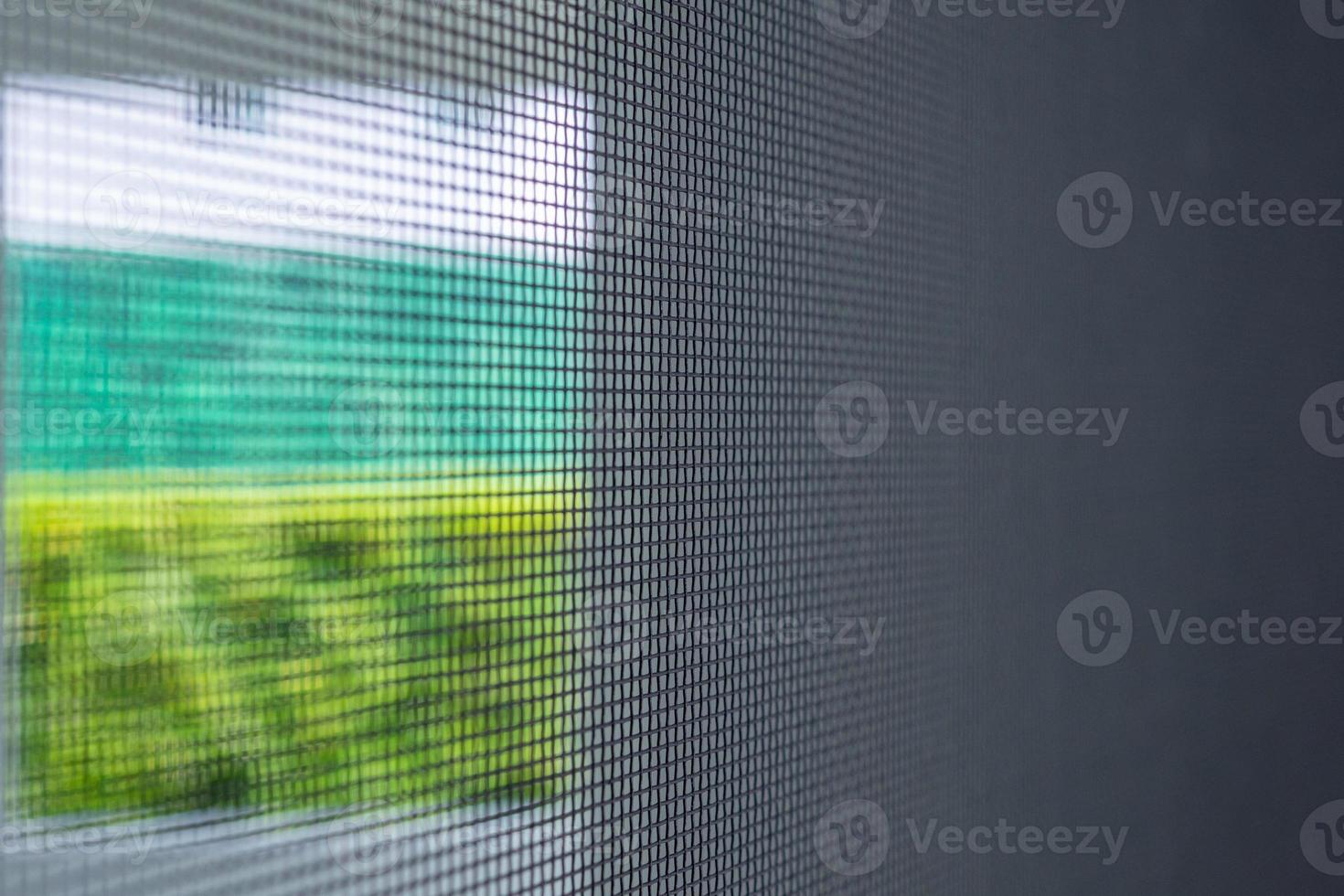 mosquito net wire screen on house window protection against insect photo