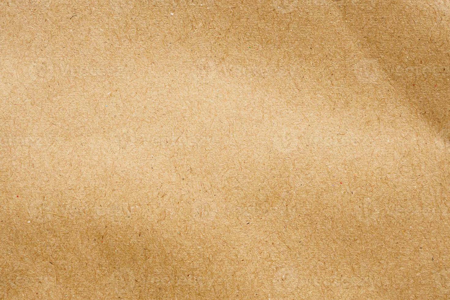 Brown paper eco recycled kraft sheet texture cardboard background photo