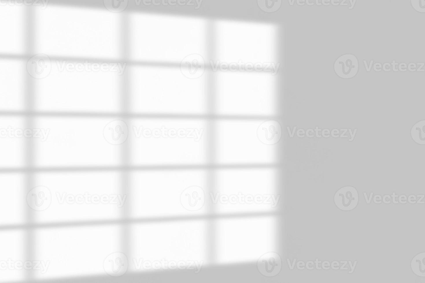 Window shadow drop on white wall background photo